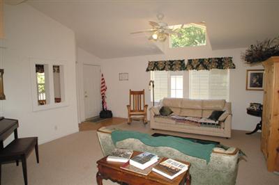 2701 Muir Mill Road Willits, CA 95490 - Photo 2 of 11 a living room with furniture and a large window