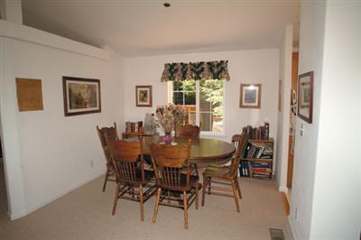 2701 Muir Mill Road Willits, CA 95490 - Photo 4 of 11 a view of a dining room with furniture and a window