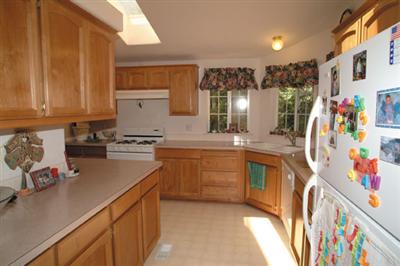 2701 Muir Mill Road Willits, CA 95490 - Photo 5 of 11 a kitchen with stainless steel appliances granite countertop a sink and cabinets