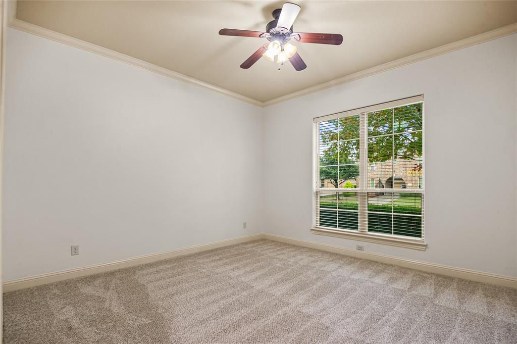 961 Deer Run Prosper, TX 75078 - Photo 6 of 34 a view of a livingroom with a ceiling fan and window