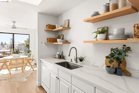 a bathroom with a sink vanity and a mirror