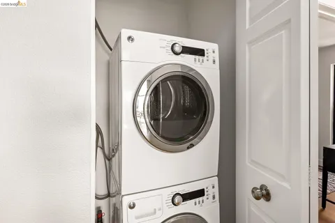 a bathroom with a shower a toilet and a shower