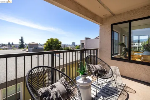 a kitchen with cabinets a sink and wooden floor