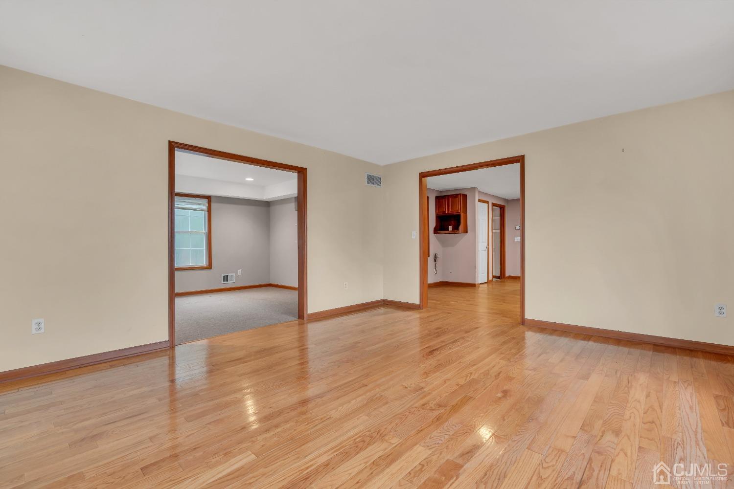 231 Station Road Monroe Township, NJ 08831 - Photo 13 of 36 wooden floor in an empty room