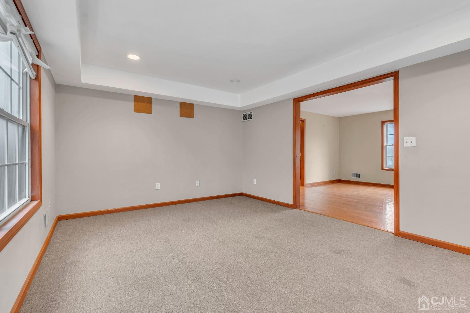 231 Station Road Monroe Township, NJ 08831 - Photo 15 of 36 a view of an empty room with a window