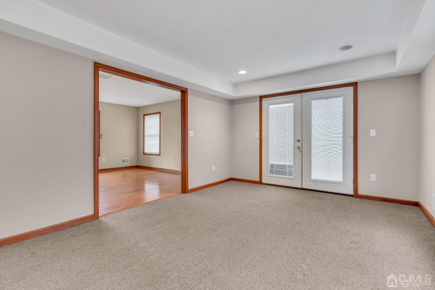 231 Station Road Monroe Township, NJ 08831 - Photo 16 of 36 a view of an empty room with a window