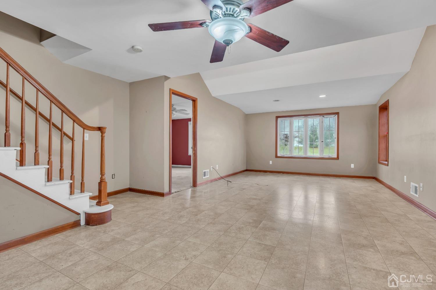 231 Station Road Monroe Township, NJ 08831 - Photo 18 of 36 a view of an empty room with a window