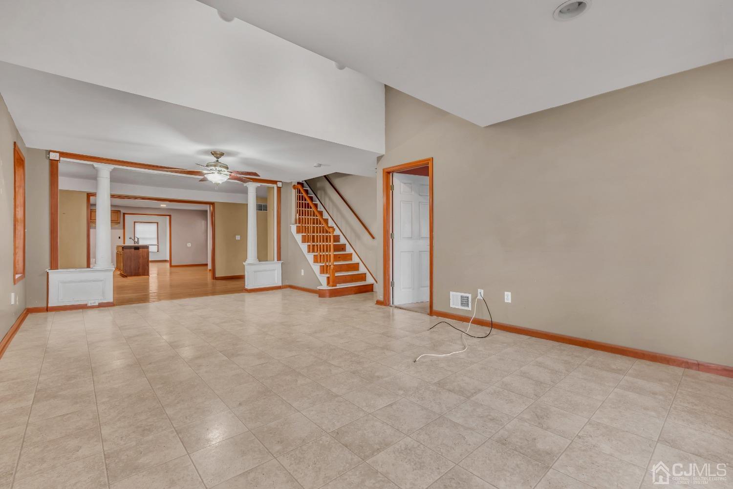 231 Station Road Monroe Township, NJ 08831 - Photo 19 of 36 a view of an empty room with stairs