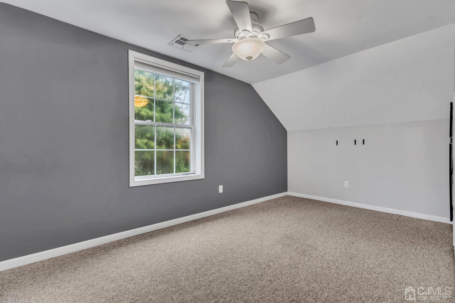 231 Station Road Monroe Township, NJ 08831 - Photo 21 of 36 a view of an empty room with a window