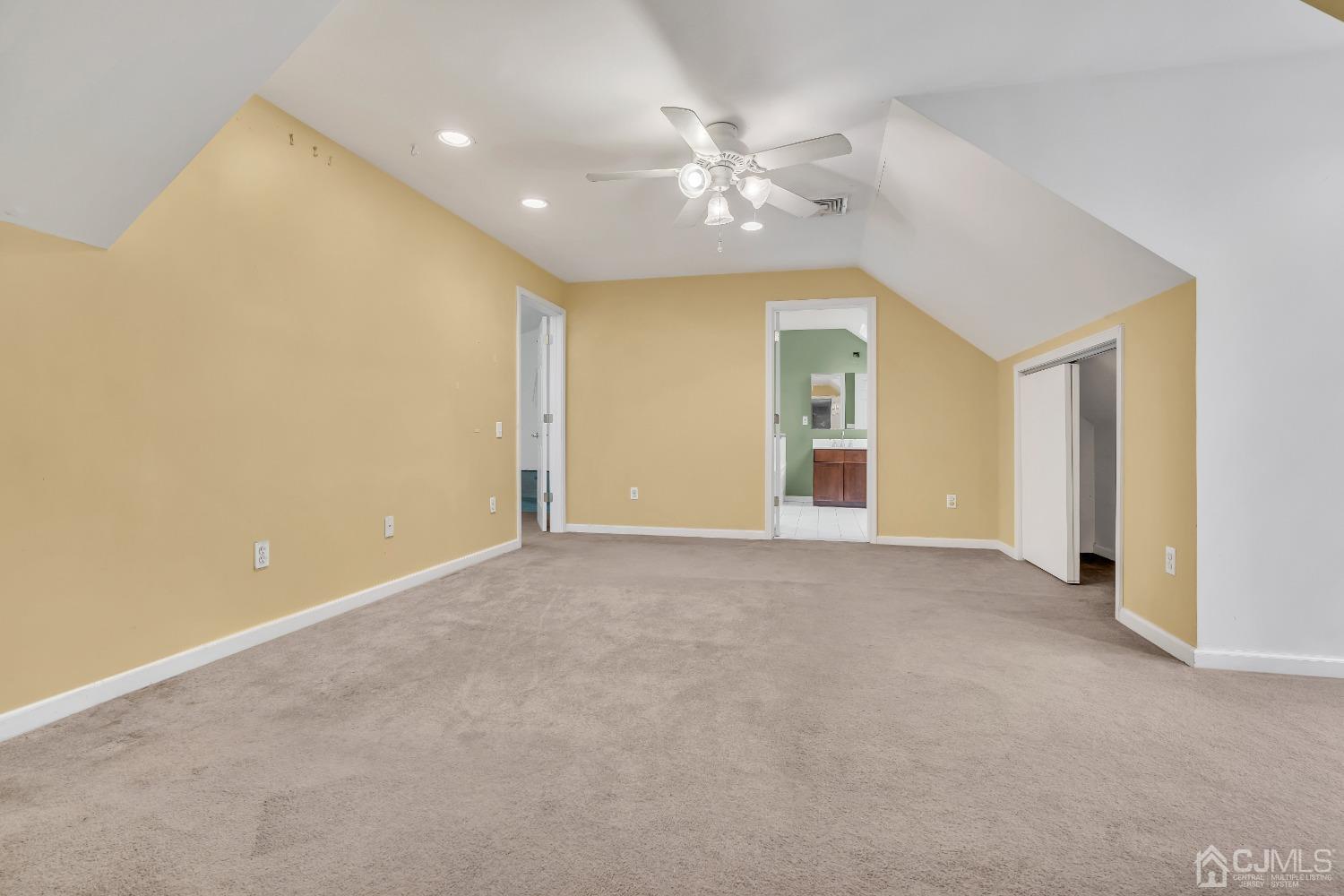 231 Station Road Monroe Township, NJ 08831 - Photo 25 of 36 a view of an empty room with chandelier fan