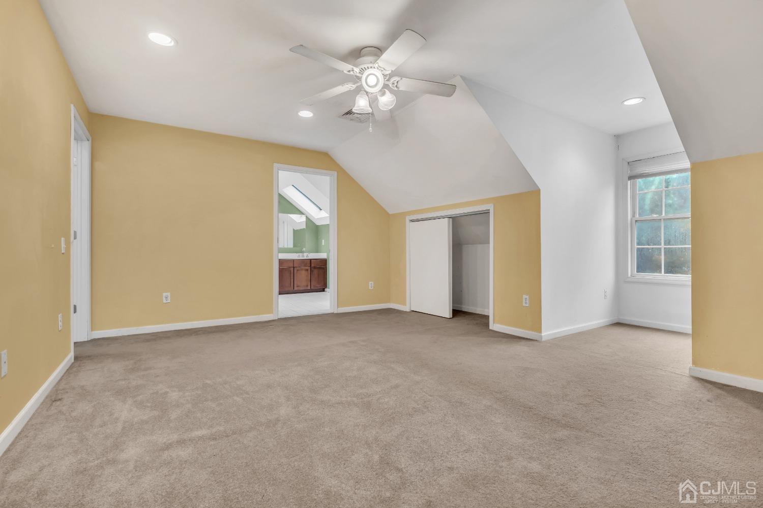 231 Station Road Monroe Township, NJ 08831 - Photo 26 of 36 an empty room with windows and ceiling fan