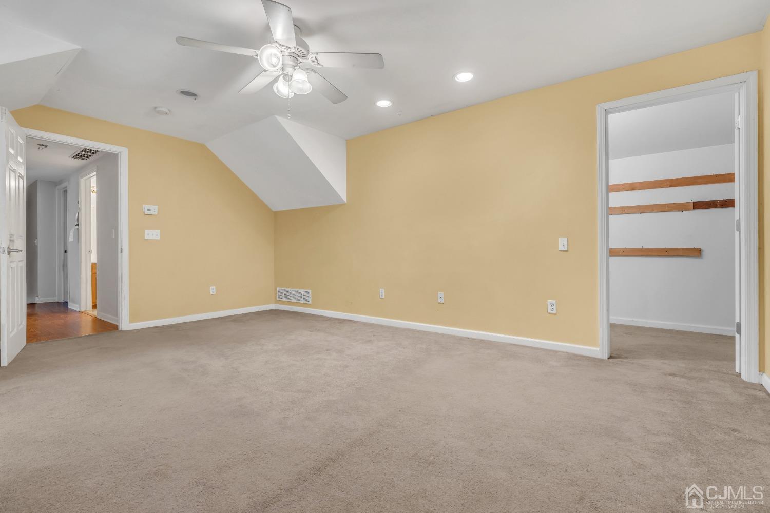 231 Station Road Monroe Township, NJ 08831 - Photo 27 of 36 an empty room with closet and windows