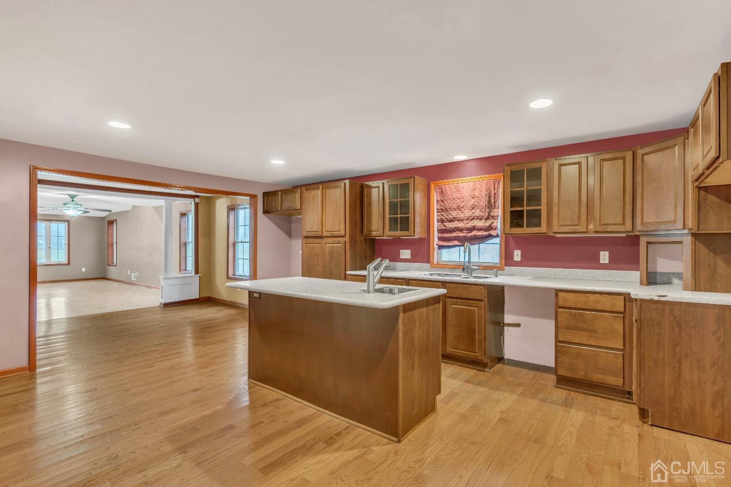 231 Station Road Monroe Township, NJ 08831 - Photo 9 of 36 a kitchen with stainless steel appliances granite countertop a sink and cabinets