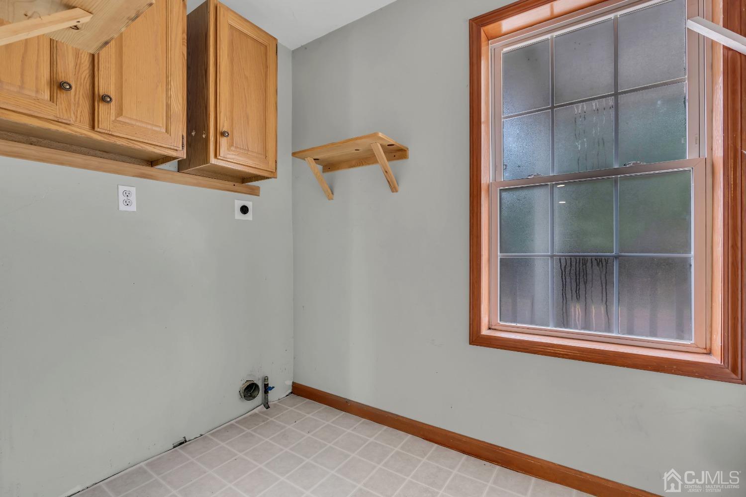 231 Station Road Monroe Township, NJ 08831 - Photo 10 of 36 a view of a room with rack on the wall