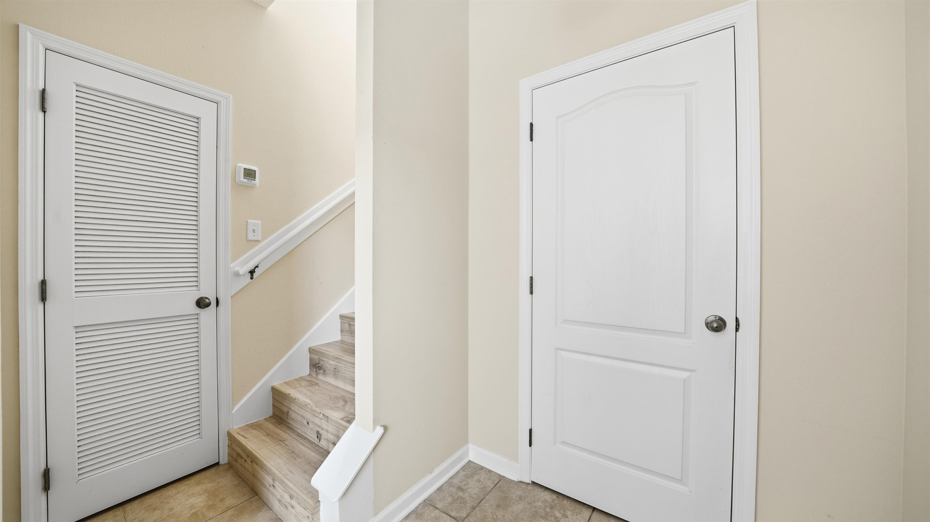 1121 Overdale Road St. Augustine, FL 32080 - Photo 22 of 65 Stairs with tile patterned floors and baseboards