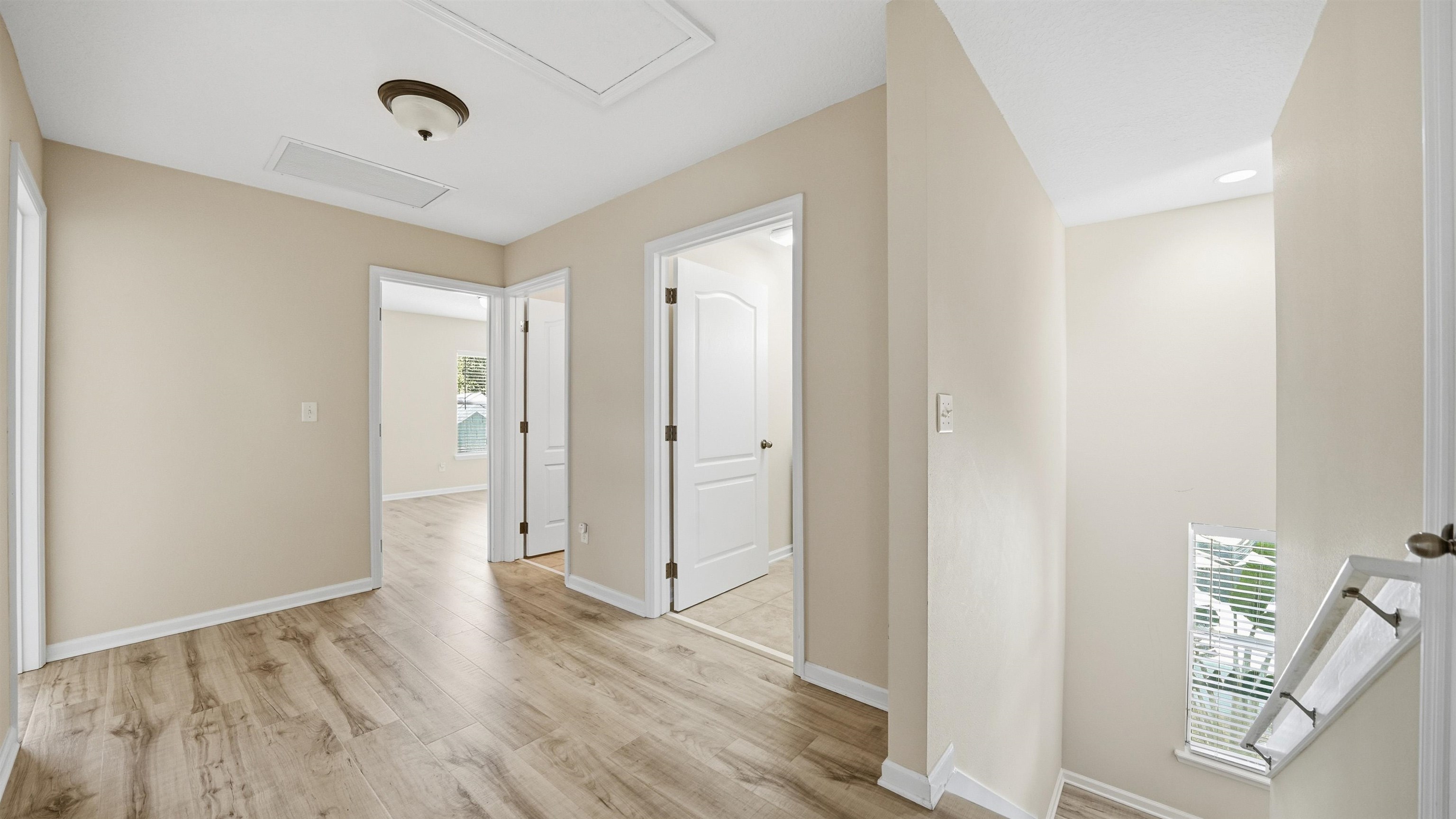 1121 Overdale Road St. Augustine, FL 32080 - Photo 23 of 65 Corridor featuring light wood-type flooring and baseboards