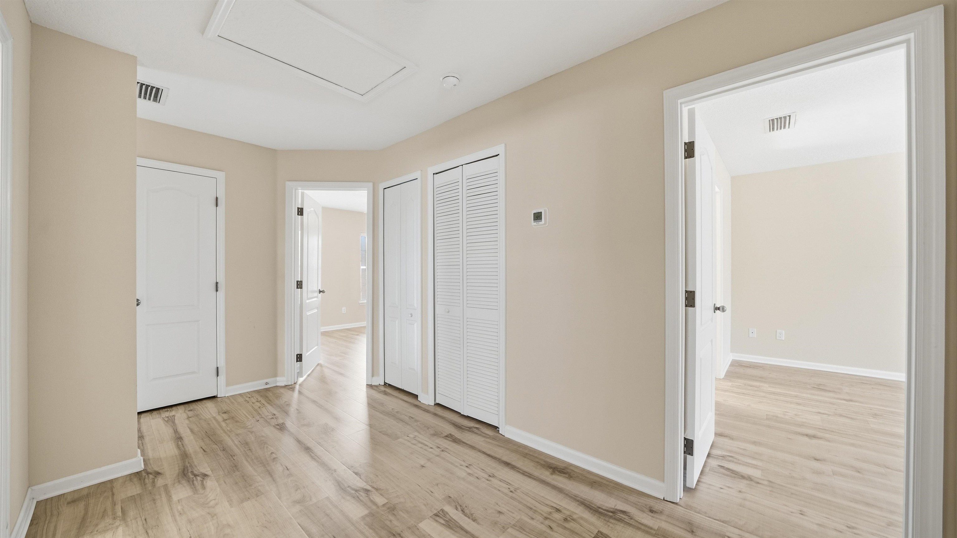 1121 Overdale Road St. Augustine, FL 32080 - Photo 24 of 65 Hallway with light wood-style flooring and baseboards