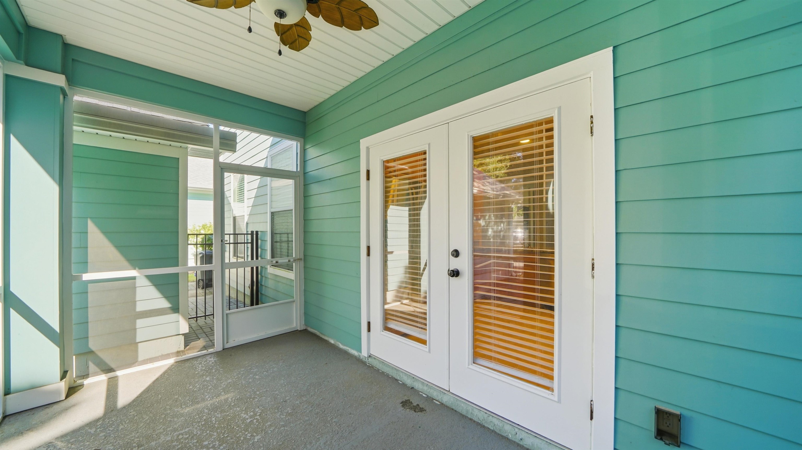 1121 Overdale Road St. Augustine, FL 32080 - Photo 40 of 65 Doorway to property with ceiling fan and a sunroom