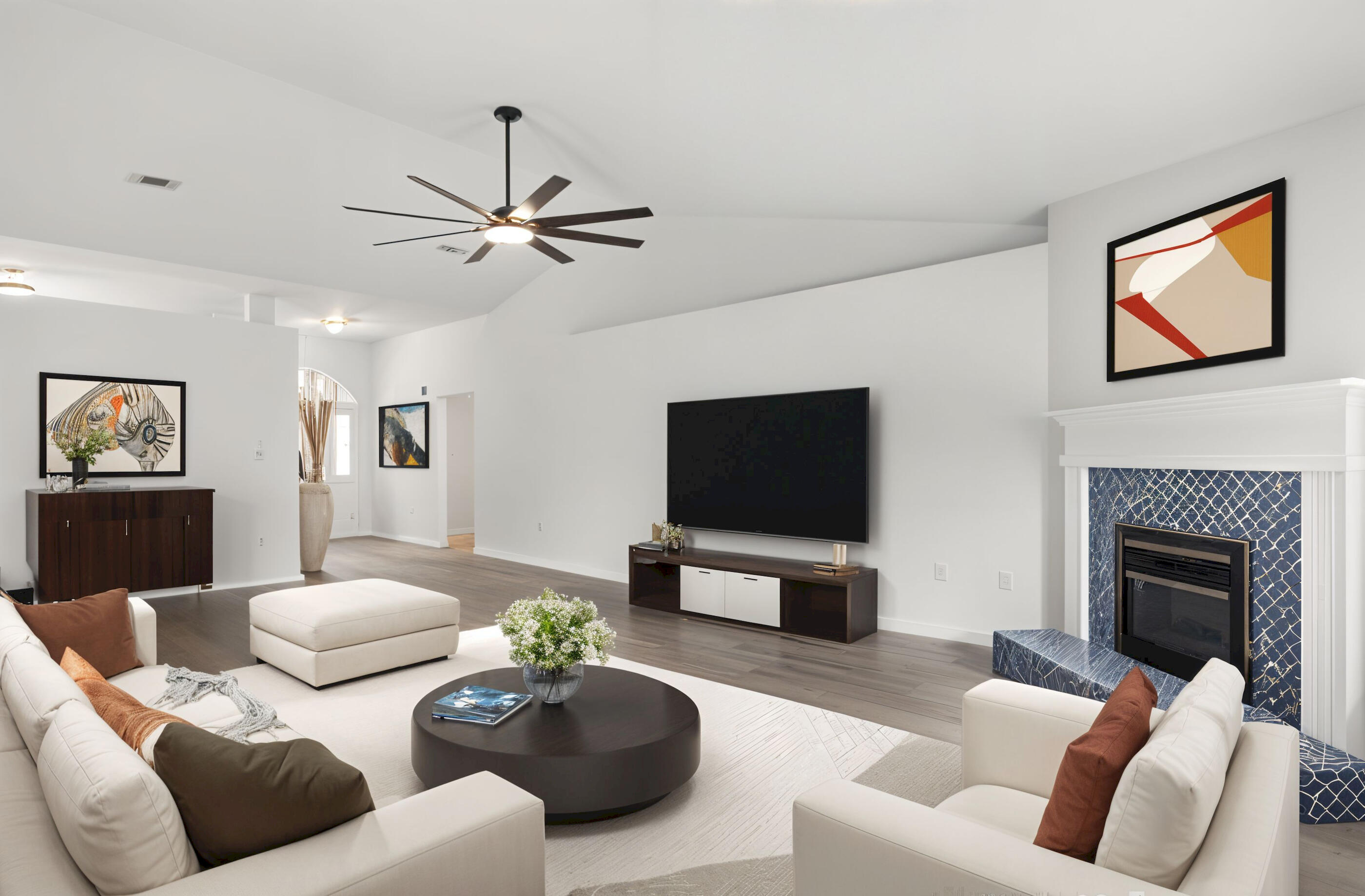 151 Beacon Way Miramar Beach, FL 32550 - Photo 1 of 42 a living room with furniture a fireplace and a flat screen tv