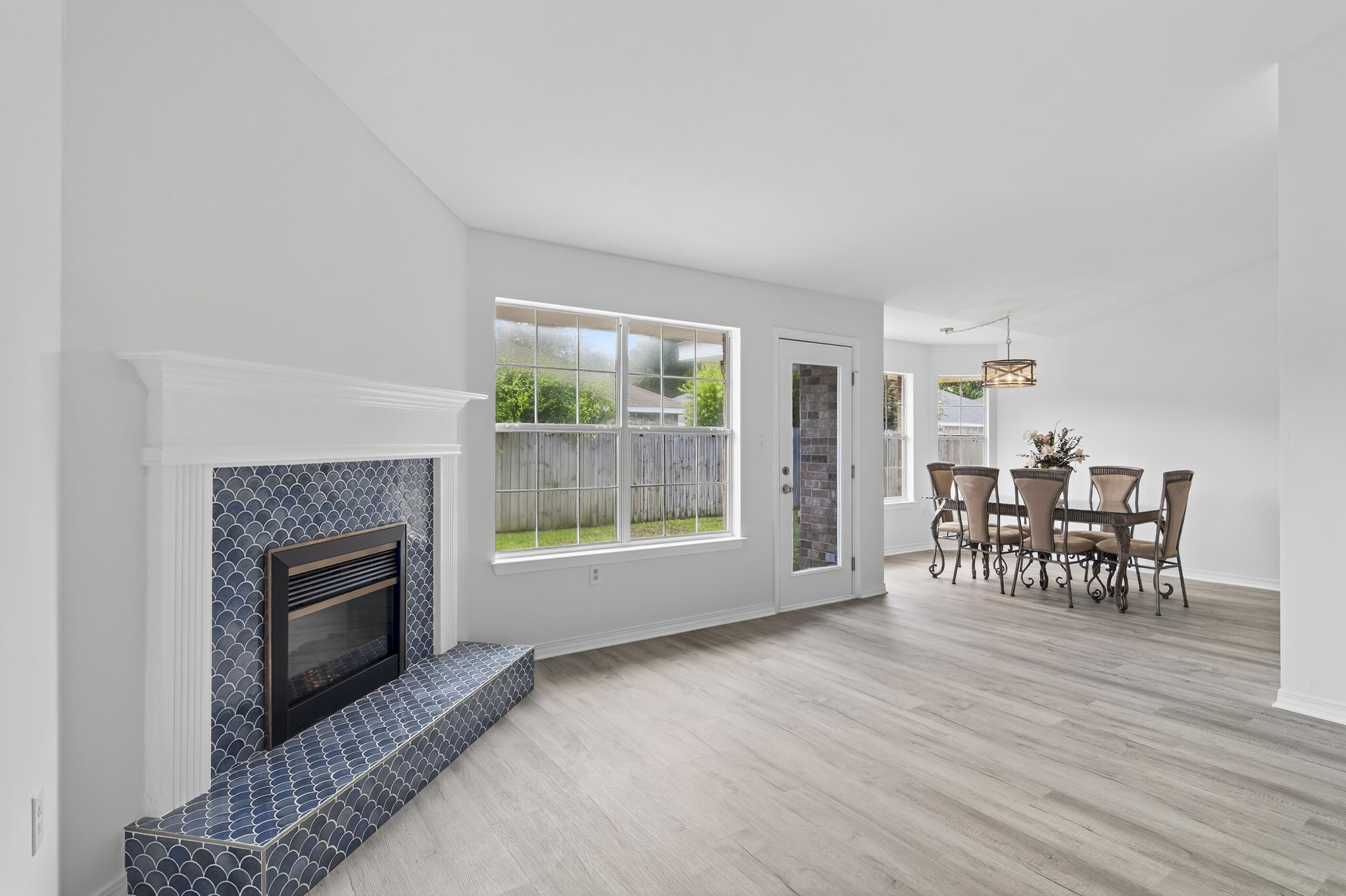 151 Beacon Way Miramar Beach, FL 32550 - Photo 16 of 42 a living room with furniture and a fireplace
