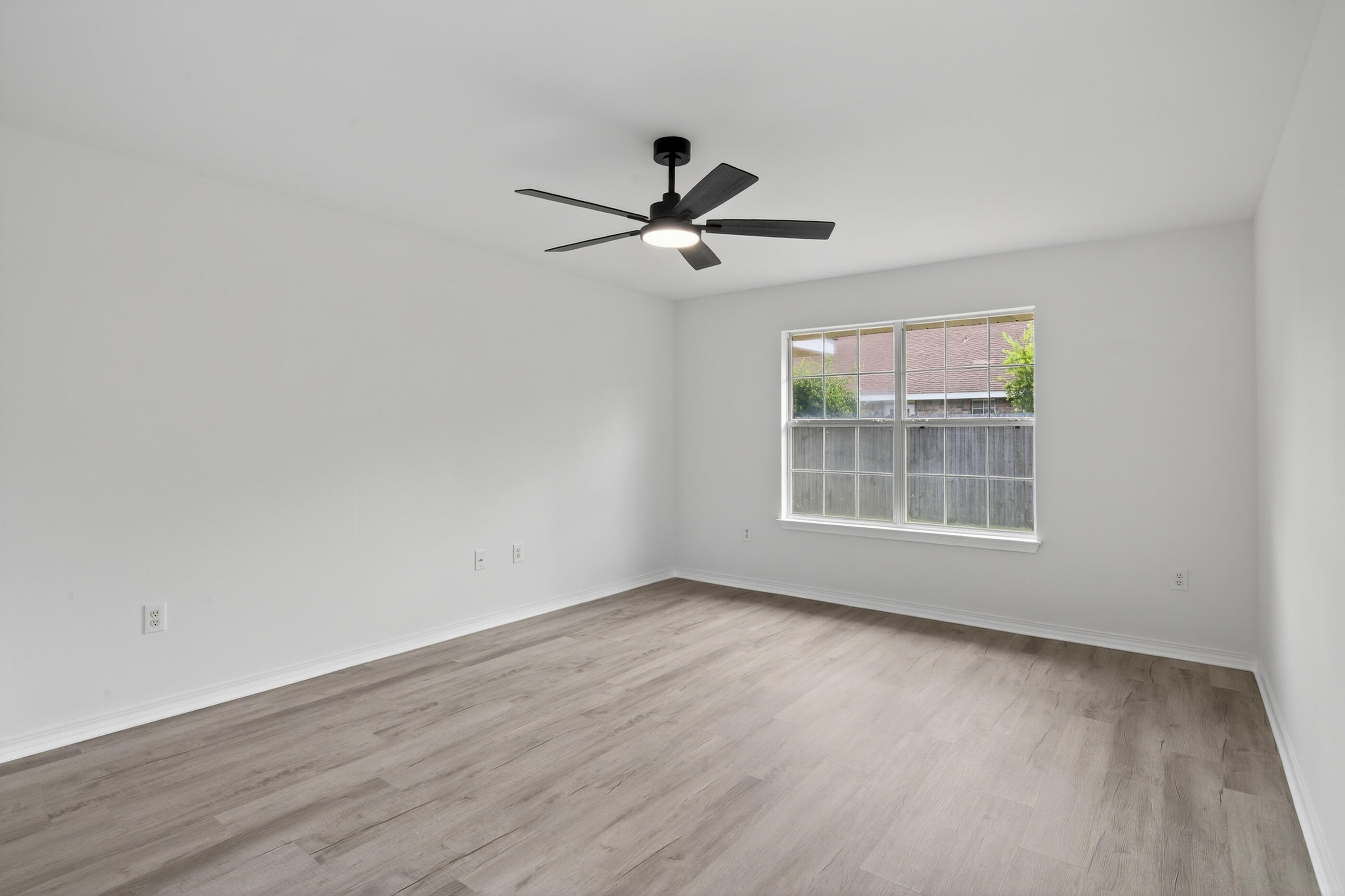 151 Beacon Way Miramar Beach, FL 32550 - Photo 27 of 42 a view of room with hardwood floor and ceiling fan