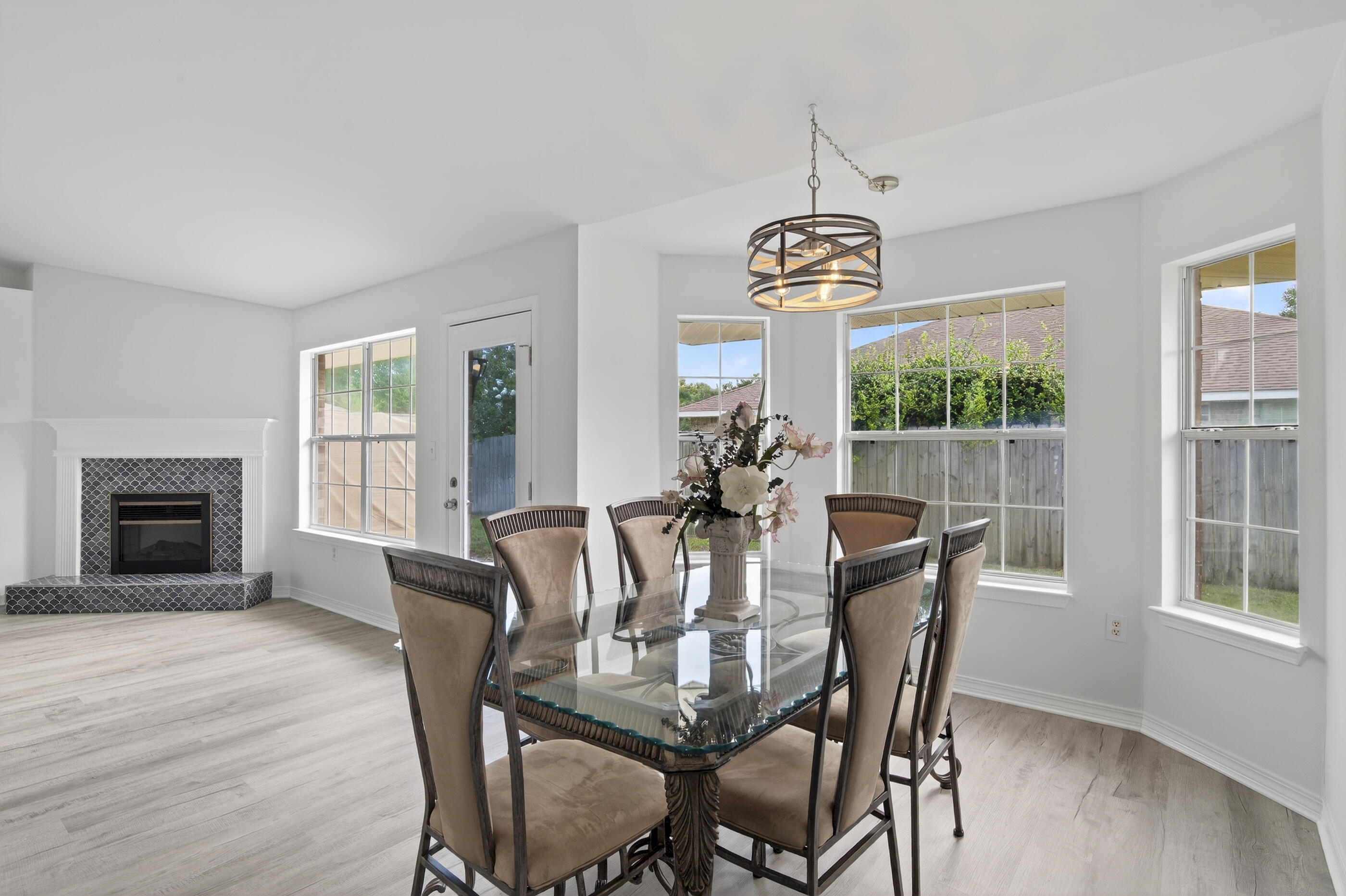 151 Beacon Way Miramar Beach, FL 32550 - Photo 5 of 42 a view of a dining room with furniture window and wooden floor