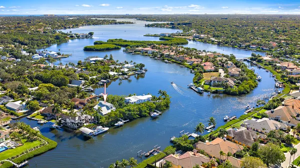 an aerial view of lake residential house with outdoor space