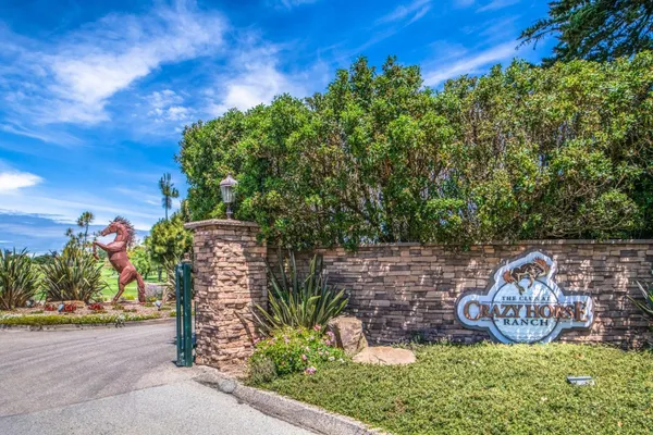 a view of balcony with wooden floor
