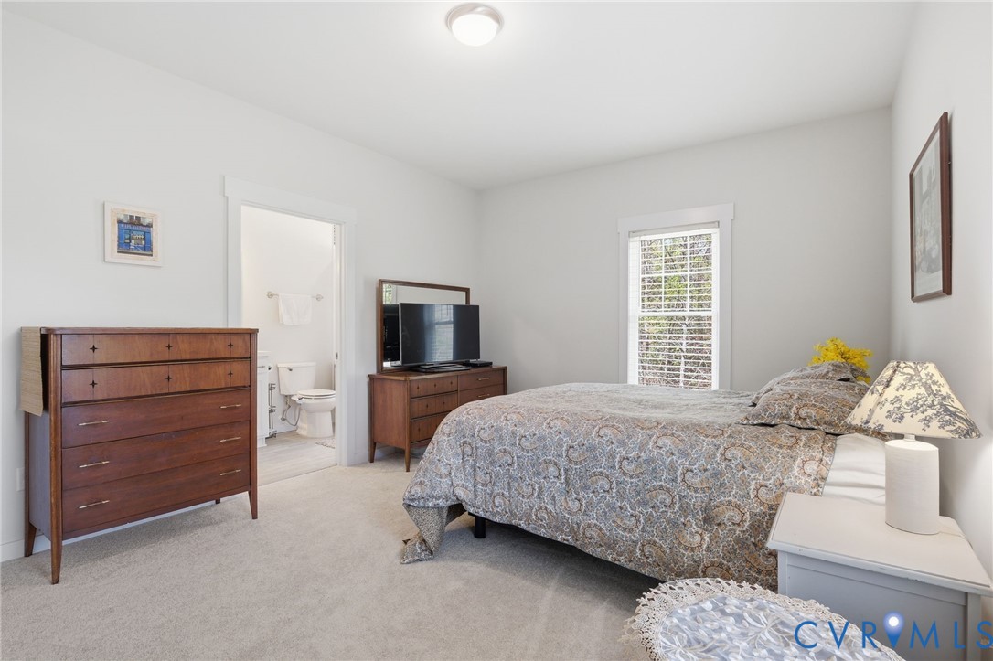605 Carldan Road Richmond, VA 23227 - Photo 16 of 38 a bedroom with a bed and furniture