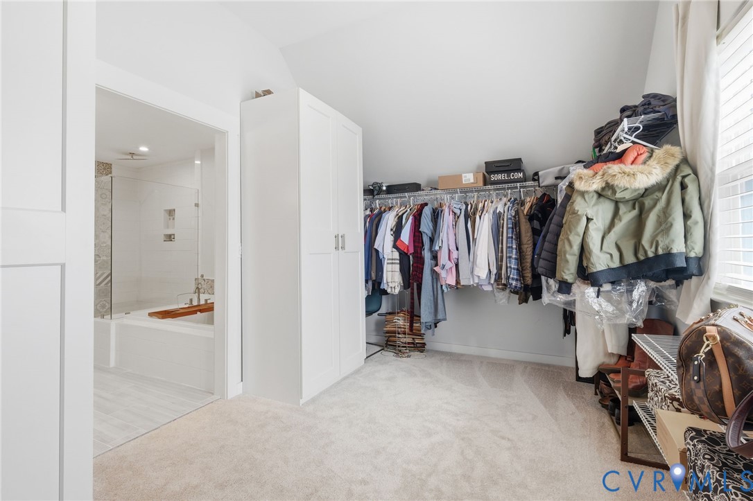 605 Carldan Road Richmond, VA 23227 - Photo 23 of 38 a view of walk in closet with clothes