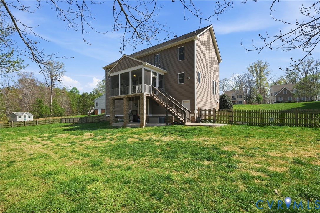 605 Carldan Road Richmond, VA 23227 - Photo 35 of 38 a view of a house with backyard and garden