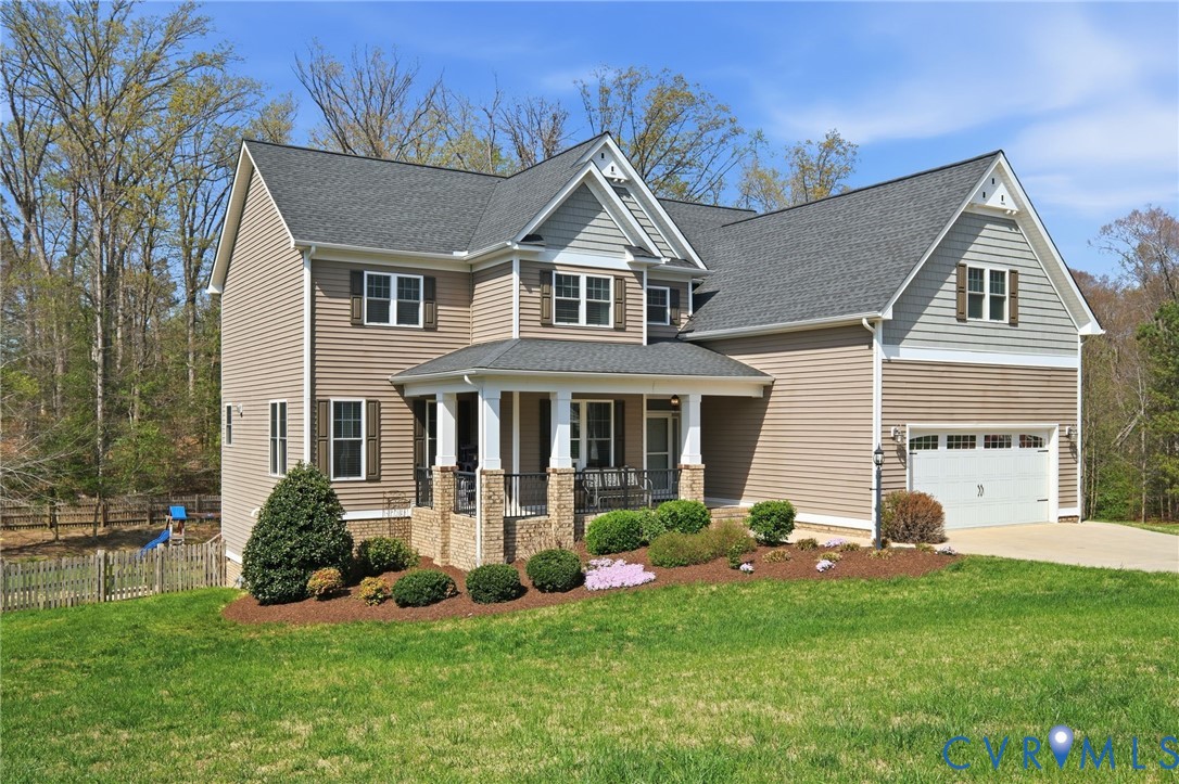 605 Carldan Road Richmond, VA 23227 - Photo 38 of 38 a front view of a house with a yard