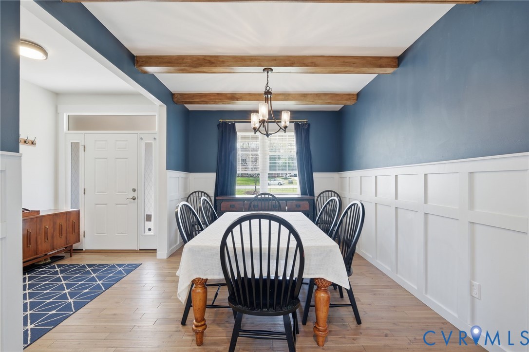 605 Carldan Road Richmond, VA 23227 - Photo 10 of 38 a view of a dining room with furniture window and wooden floor