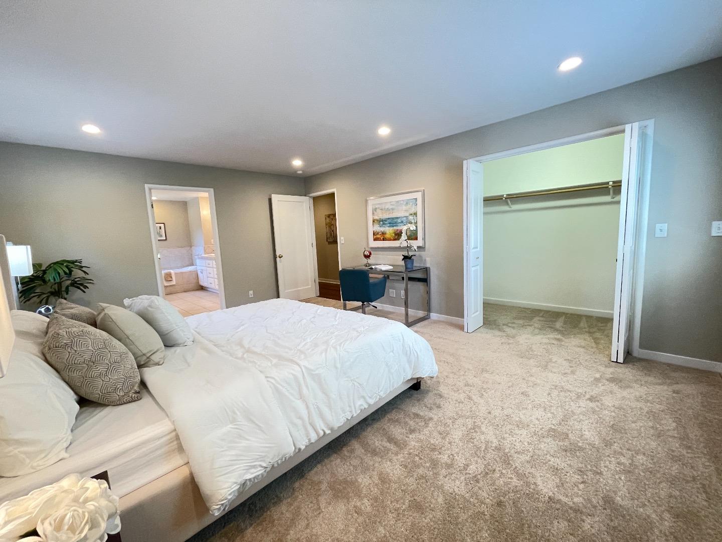 2516 Bailey Avenue San Jose, CA 95128 - Photo 17 of 54 a bed room with a bed and a large mirror