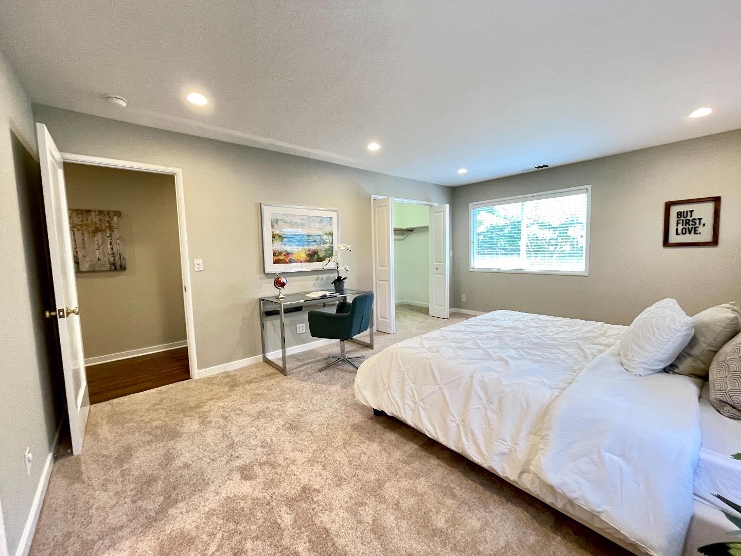 2516 Bailey Avenue San Jose, CA 95128 - Photo 18 of 54 a bedroom with a large bed and a window