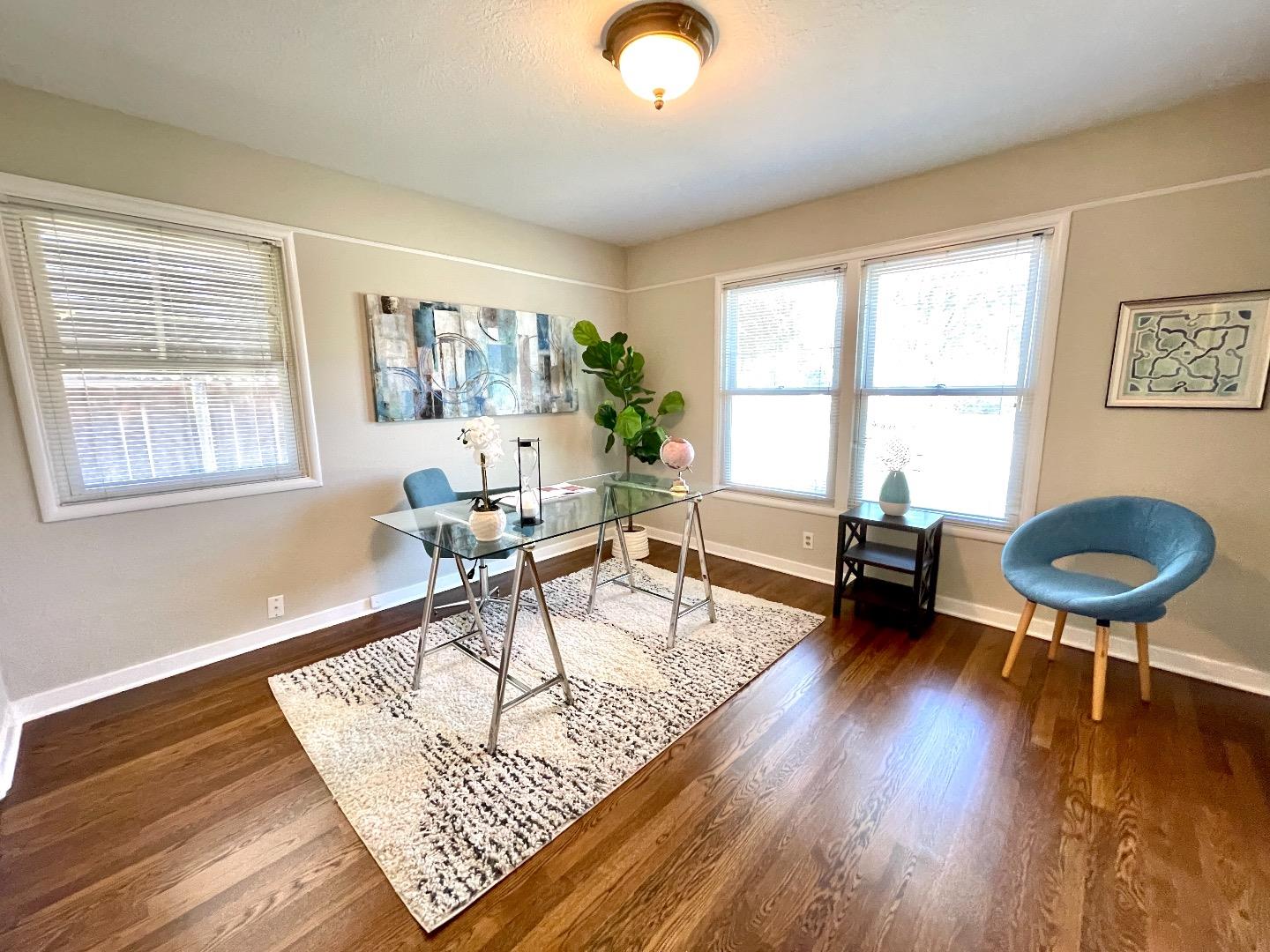 2516 Bailey Avenue San Jose, CA 95128 - Photo 24 of 54 a living room with furniture and a large window