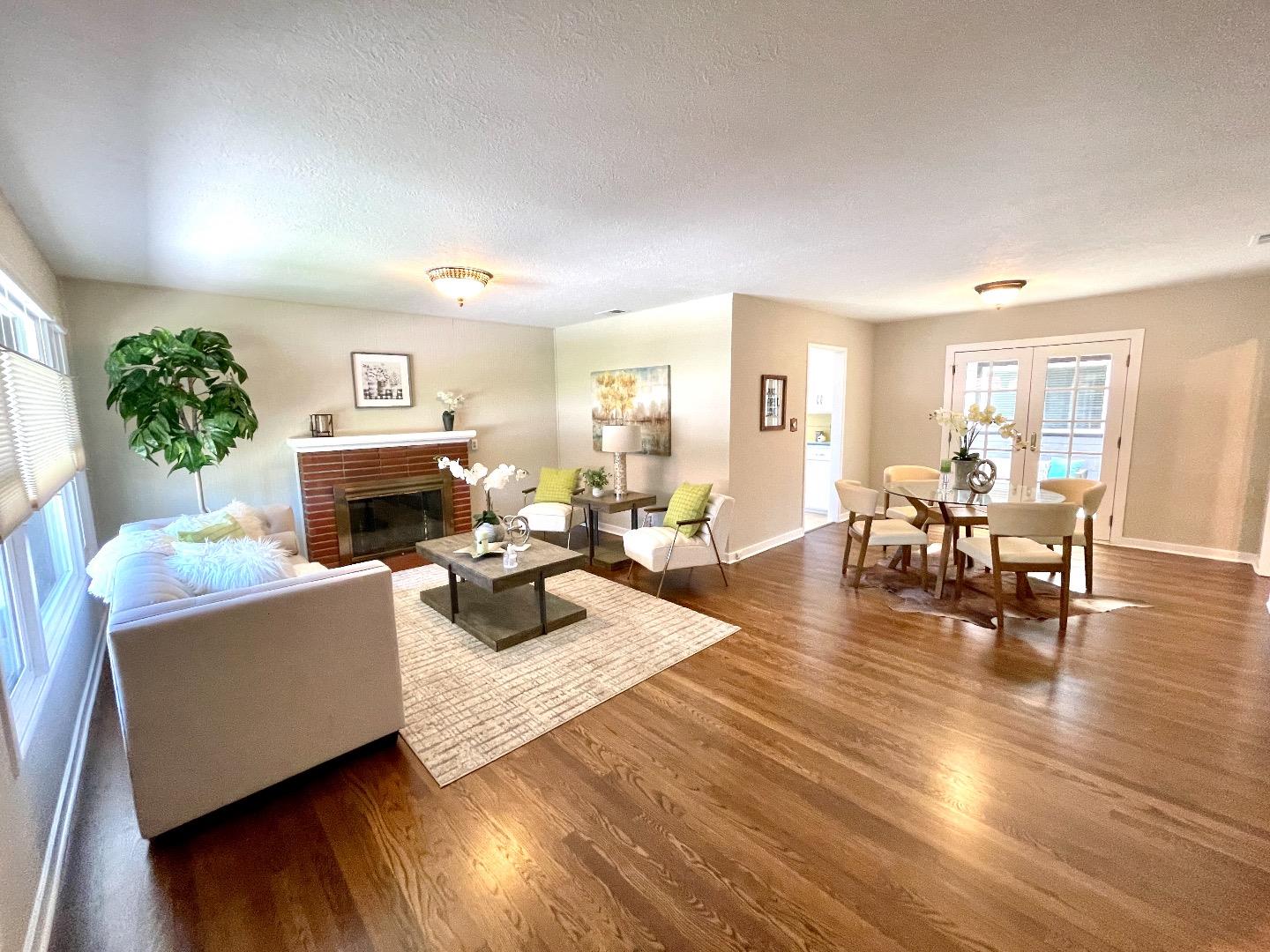 2516 Bailey Avenue San Jose, CA 95128 - Photo 4 of 54 a living room with furniture and a fireplace