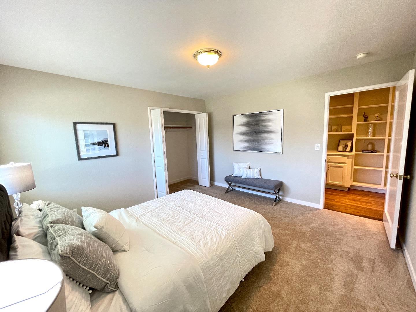 2516 Bailey Avenue San Jose, CA 95128 - Photo 34 of 54 a bedroom with a bed and a flat screen tv