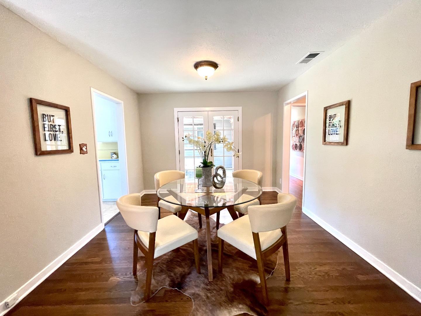 2516 Bailey Avenue San Jose, CA 95128 - Photo 7 of 54 a view of a dining room with furniture window and wooden floor