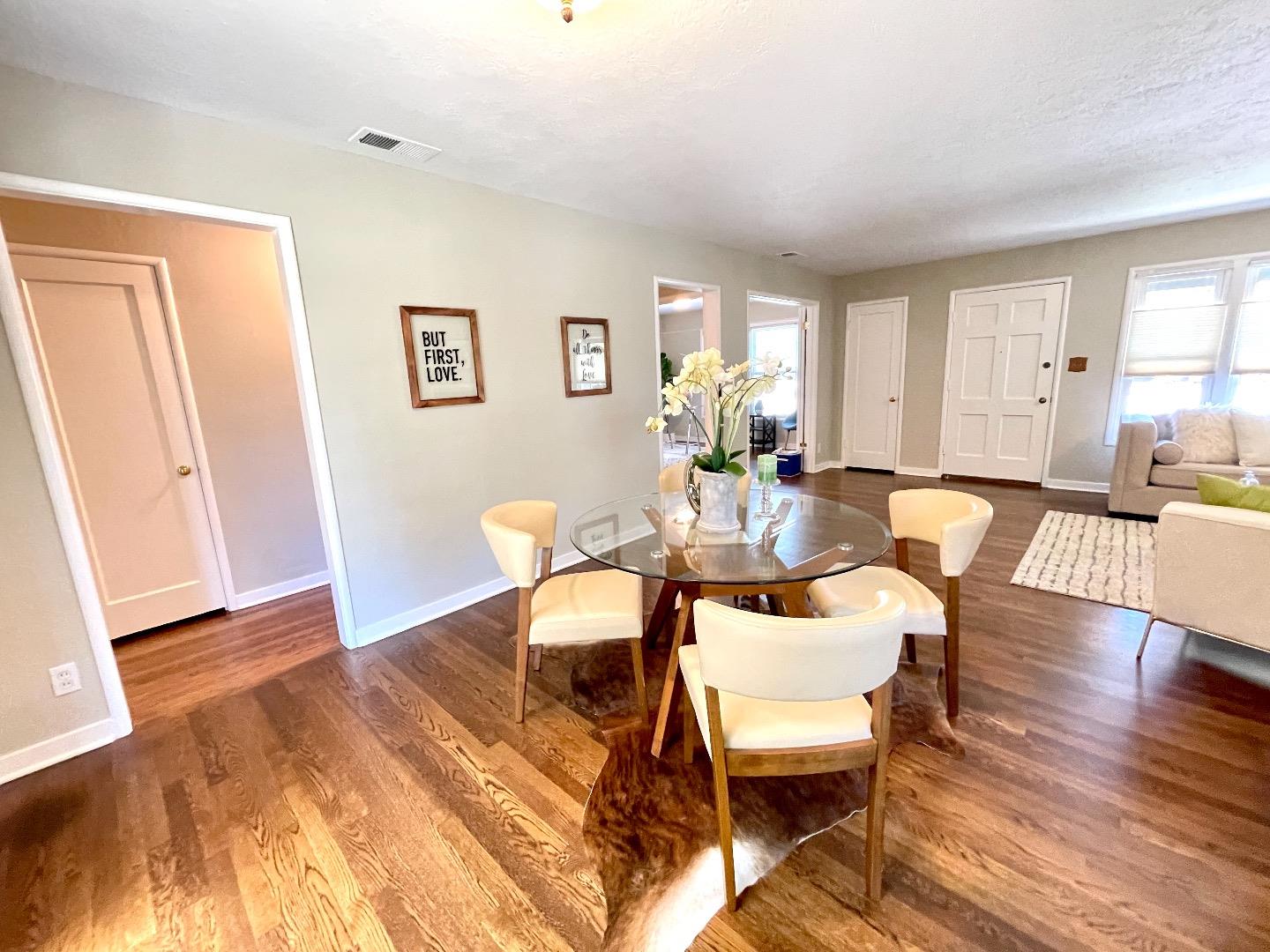 2516 Bailey Avenue San Jose, CA 95128 - Photo 8 of 54 a dining room with wooden floor and glass door