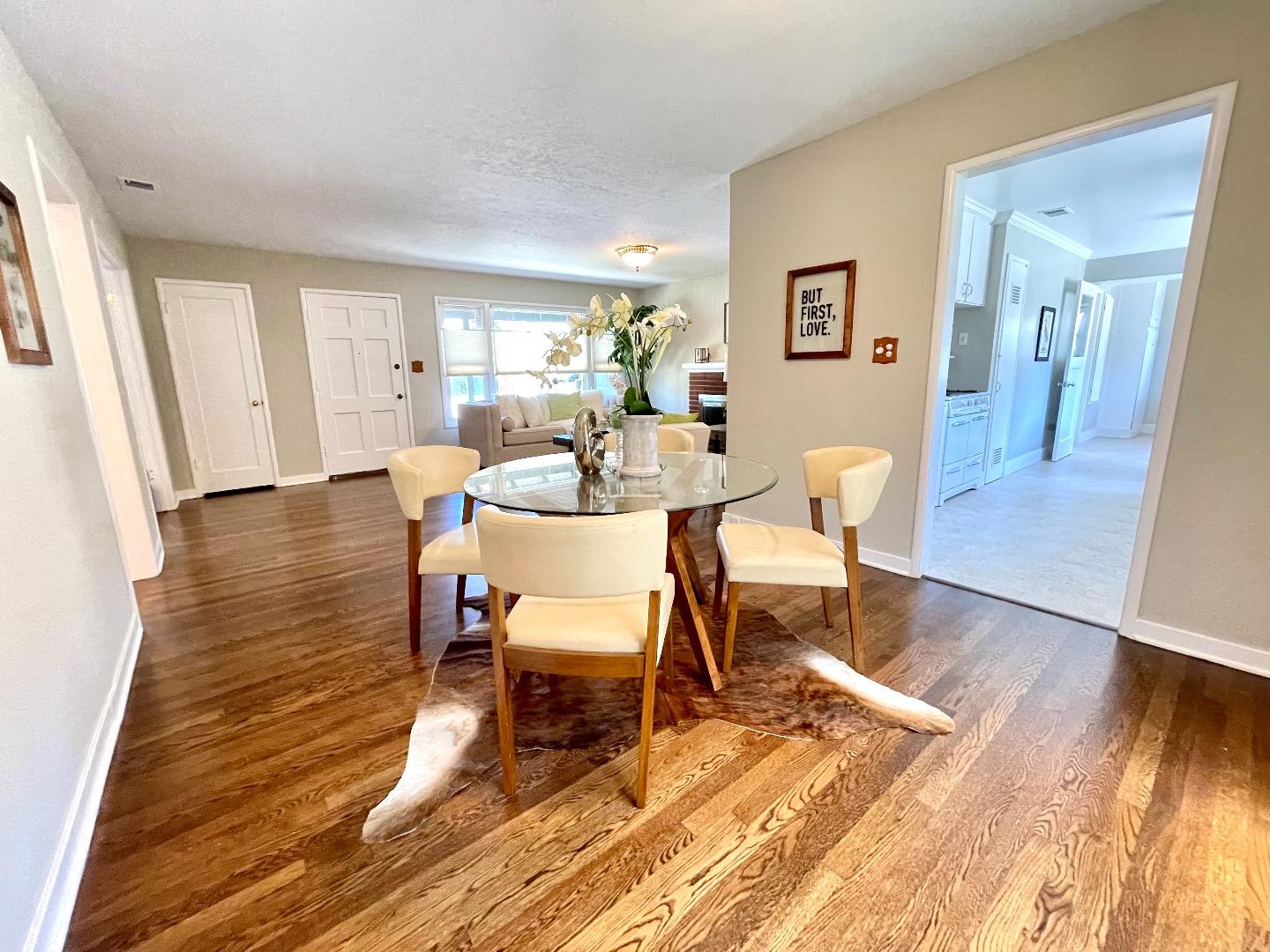 2516 Bailey Avenue San Jose, CA 95128 - Photo 9 of 54 a dining room with wooden floor and a rug