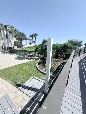 a view of a chairs and table on the terrace