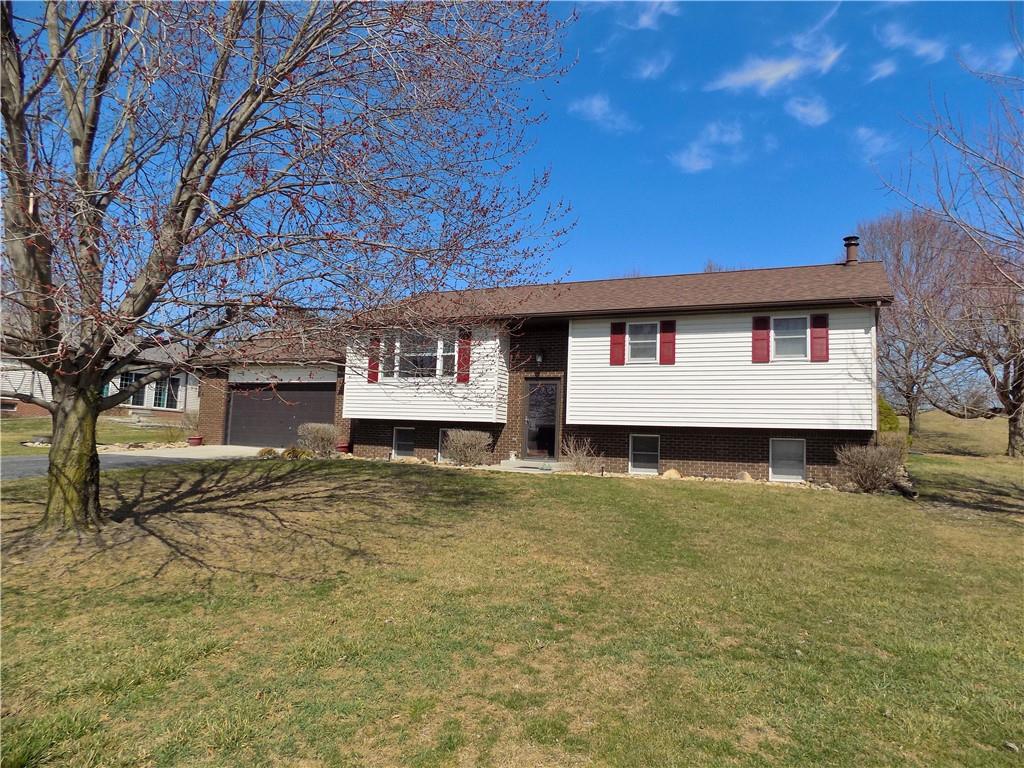 226 Eighty Acres Road Dunbar, PA 15431 - Photo 1 of 26 a view of a house with a yard