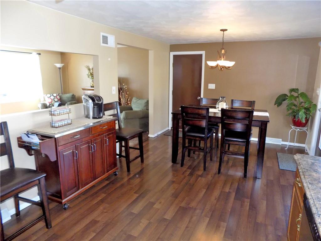 226 Eighty Acres Road Dunbar, PA 15431 - Photo 11 of 26 a view of a dining room with furniture and wooden floor