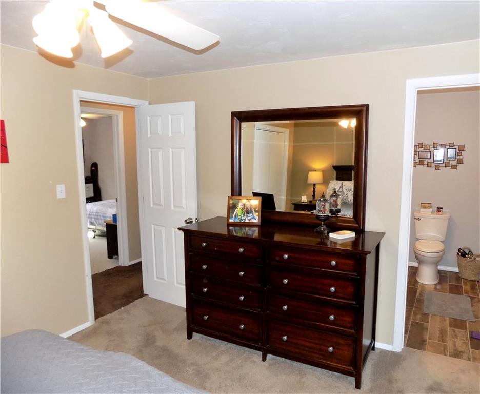 226 Eighty Acres Road Dunbar, PA 15431 - Photo 16 of 26 a room with a dresser and a mirror