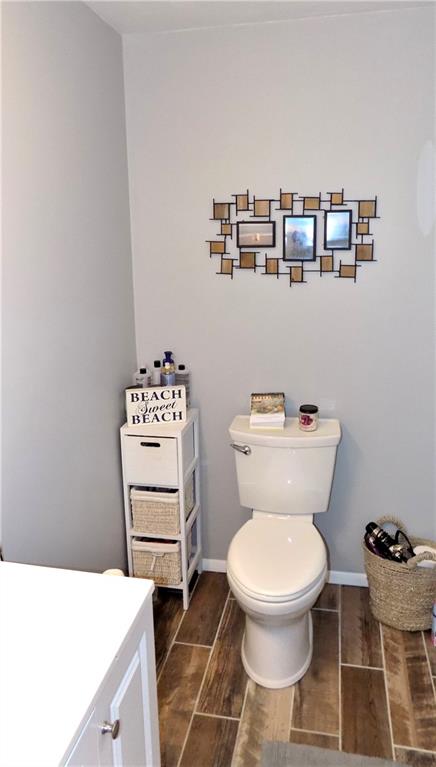 226 Eighty Acres Road Dunbar, PA 15431 - Photo 17 of 26 a bathroom with a toilet a sink and a mirror