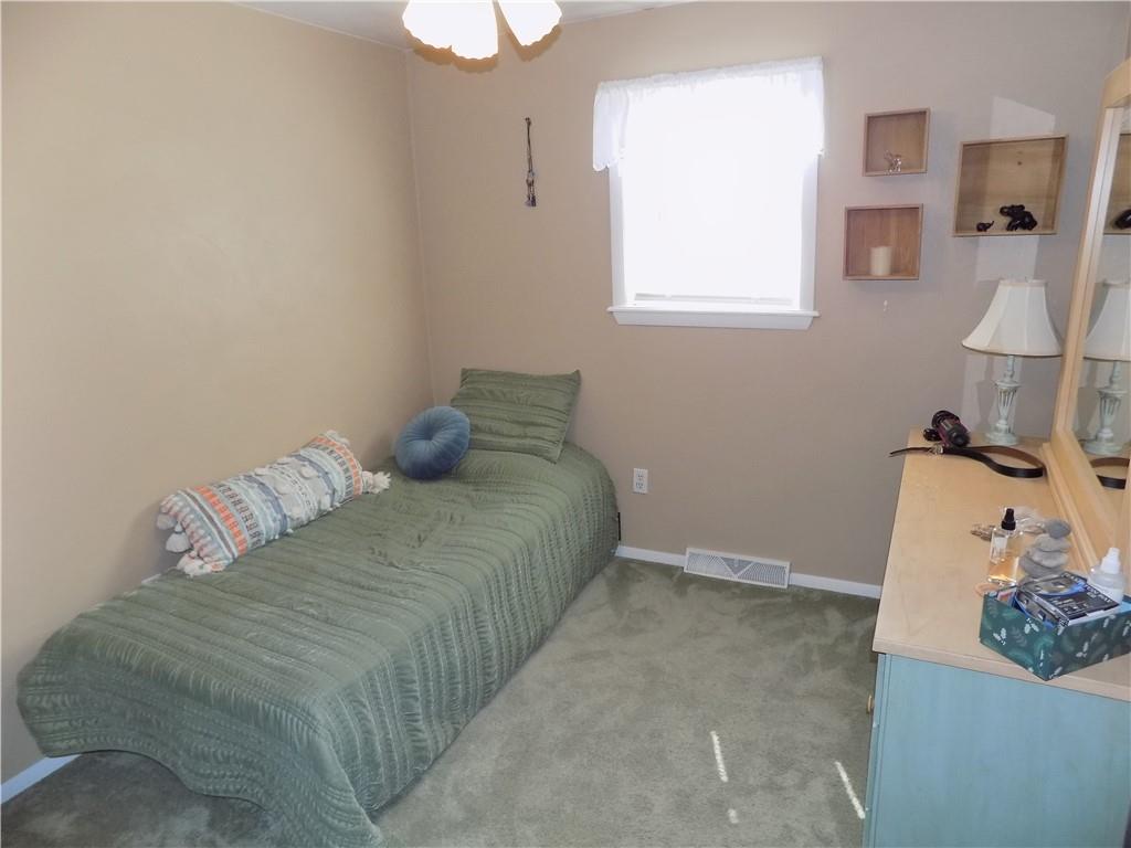 226 Eighty Acres Road Dunbar, PA 15431 - Photo 18 of 26 a bedroom with a bed and a window