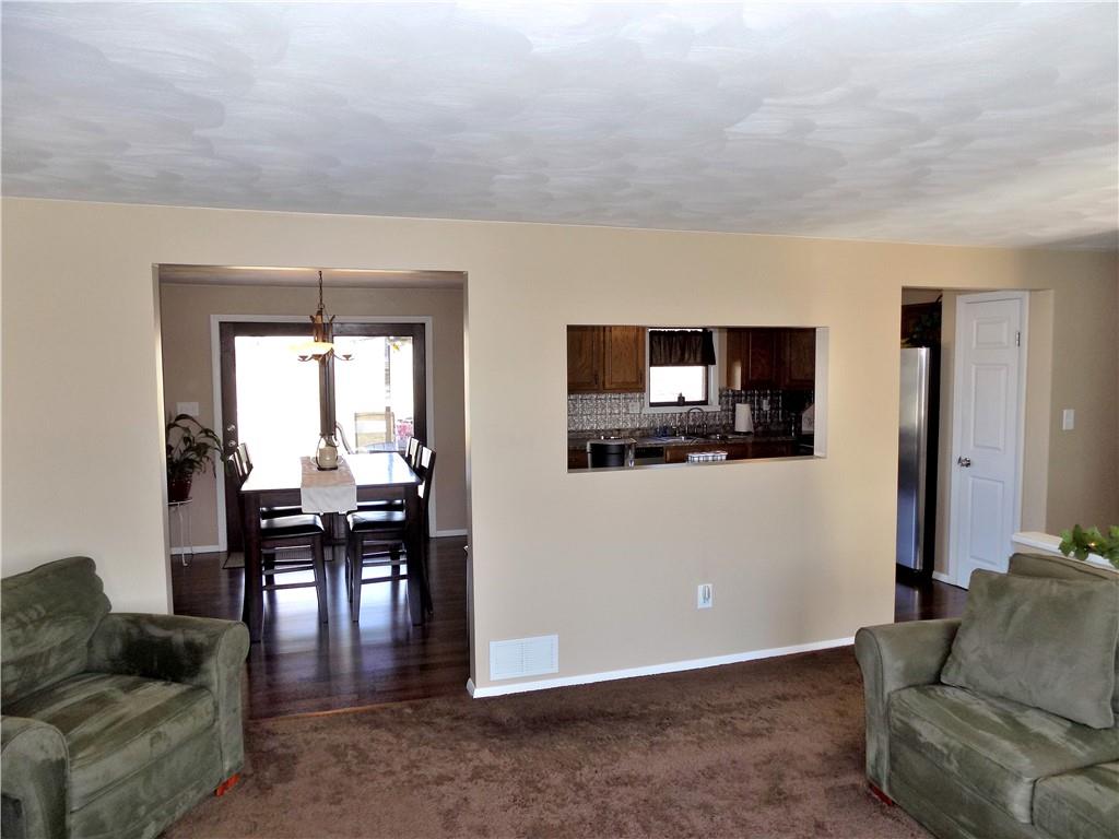 226 Eighty Acres Road Dunbar, PA 15431 - Photo 8 of 26 a living room with furniture and a flat screen tv