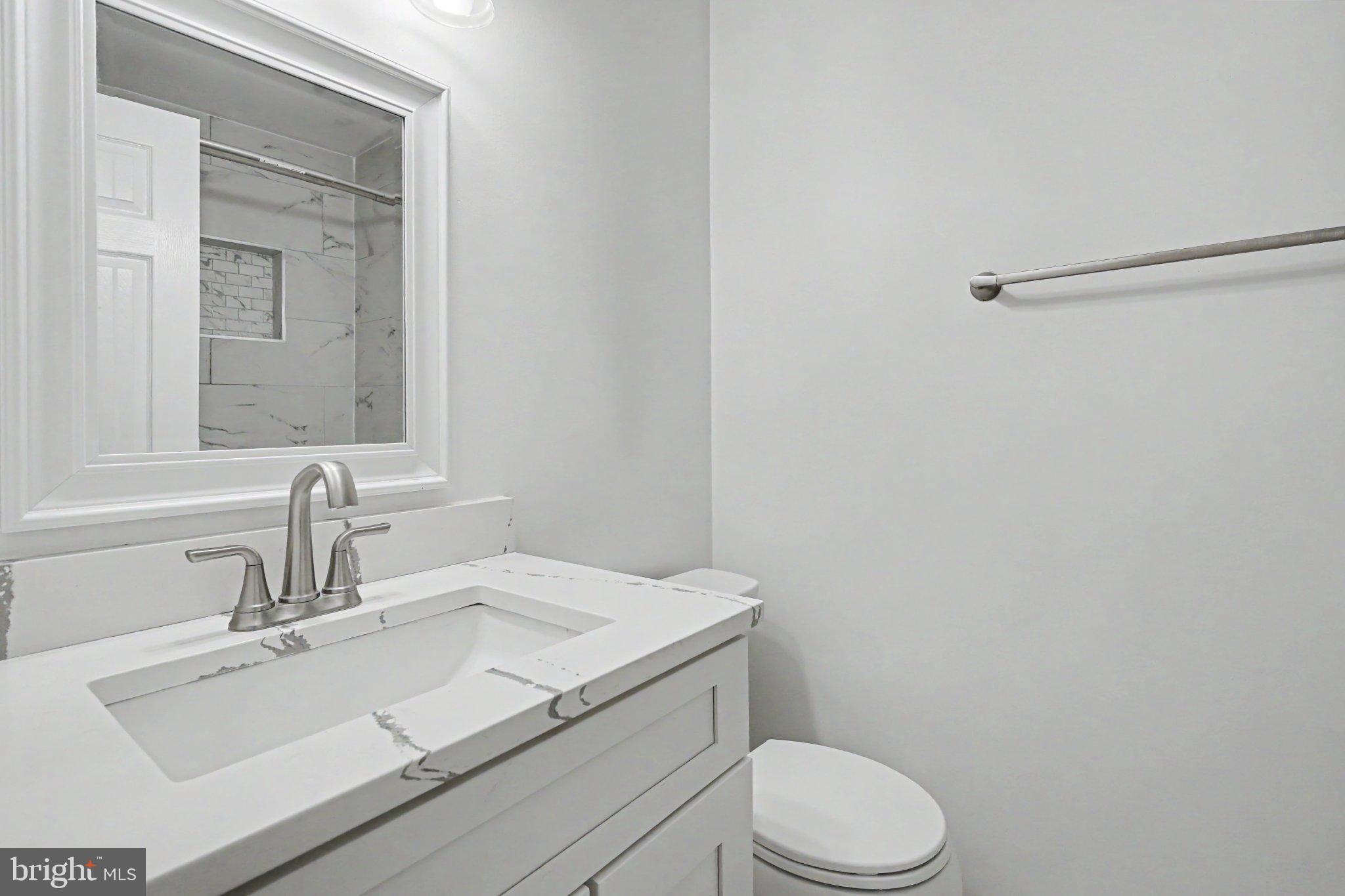 14800 Rydell Road, Unit 201 Centreville, VA 20121 - Photo 19 of 28 Sleek, modern bathroom oasis.