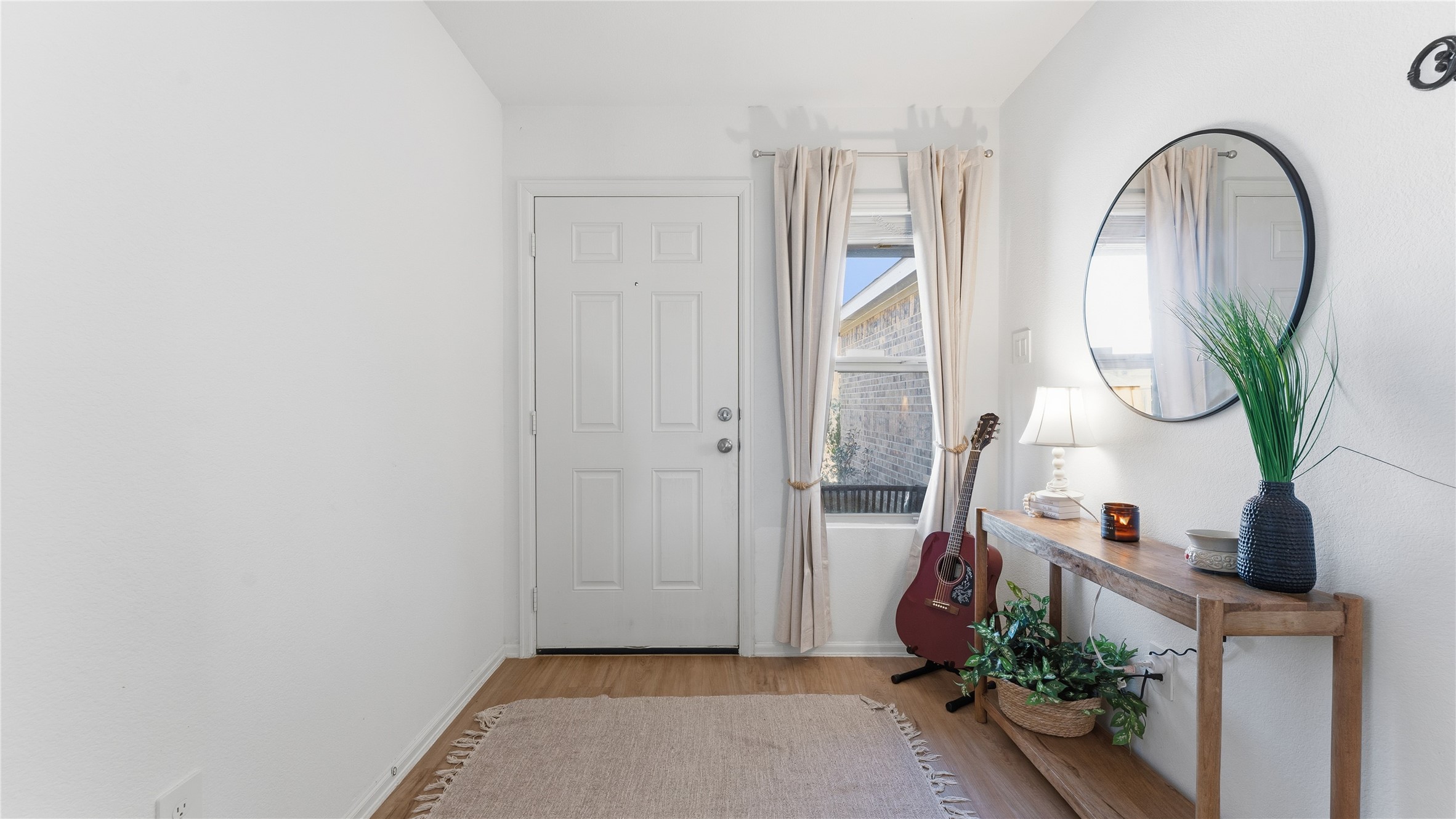 126 Spring Rose Drive Magnolia, TX 77354 - Photo 14 of 48 wooden floor with a potted plant on it